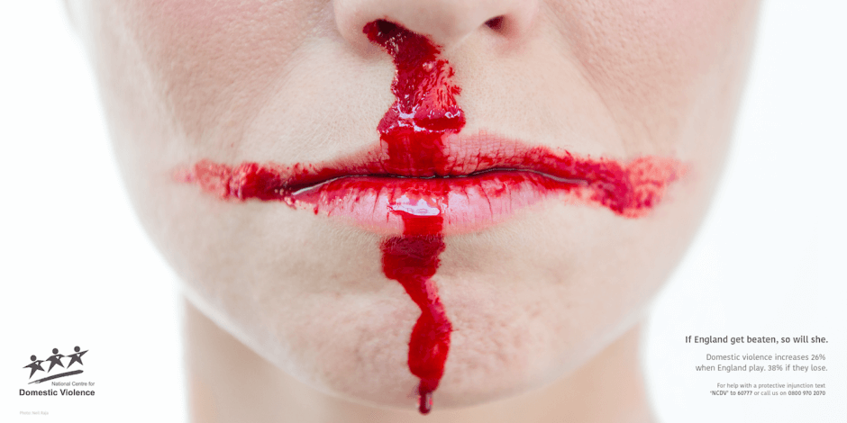 National Centre for Domestic Violence advert of a lady with a bloody nose turned into an England flag