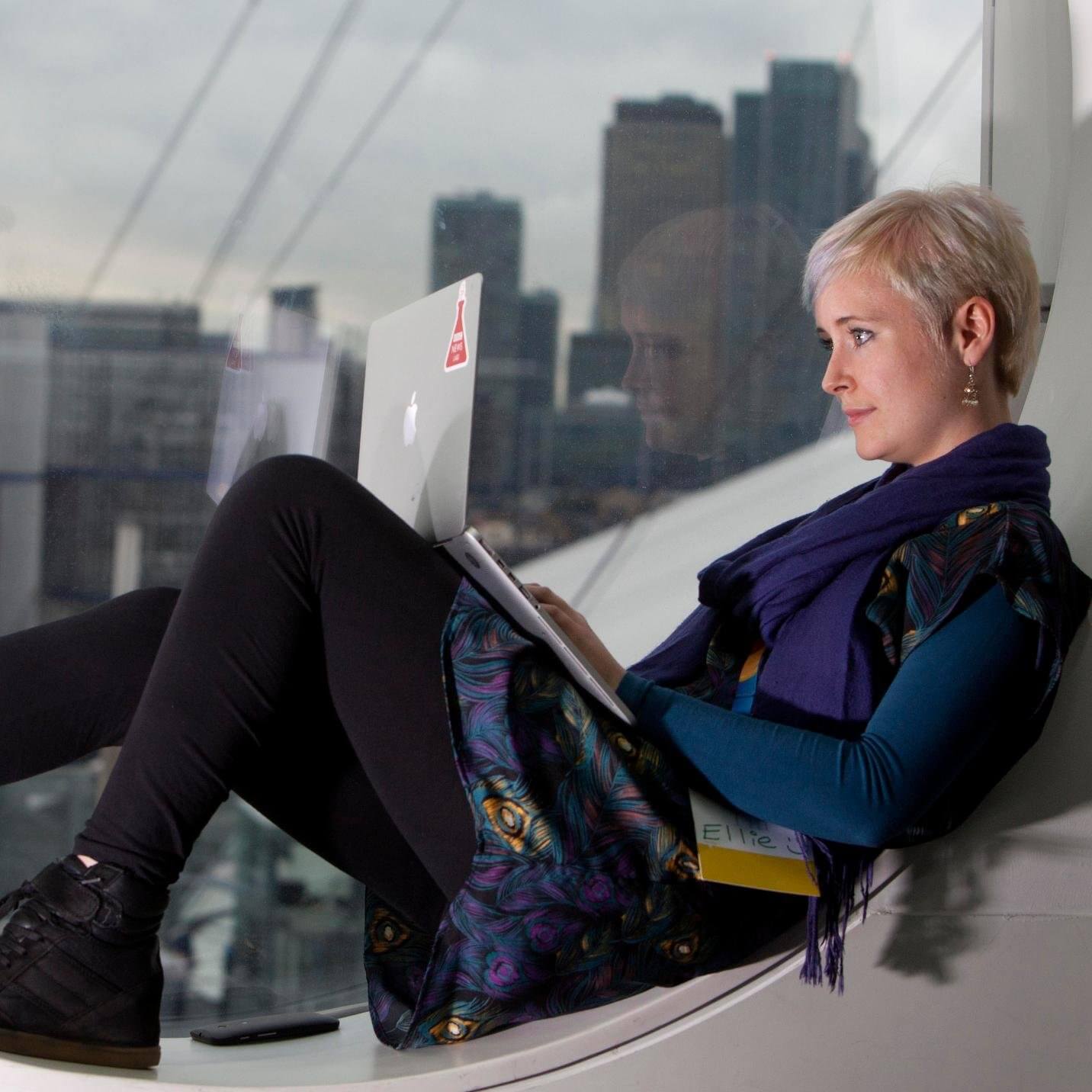 Lady laptop skyline