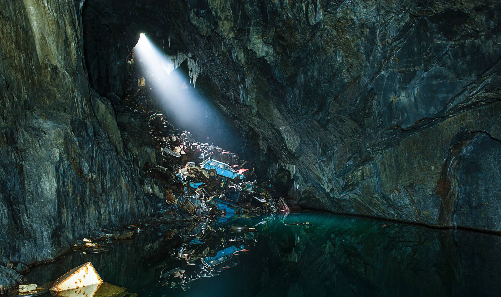 A picture of a cave filled with rubbish