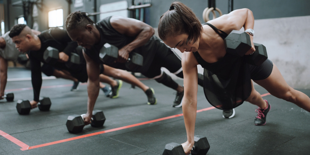 Group working out with weights - The PHA Group