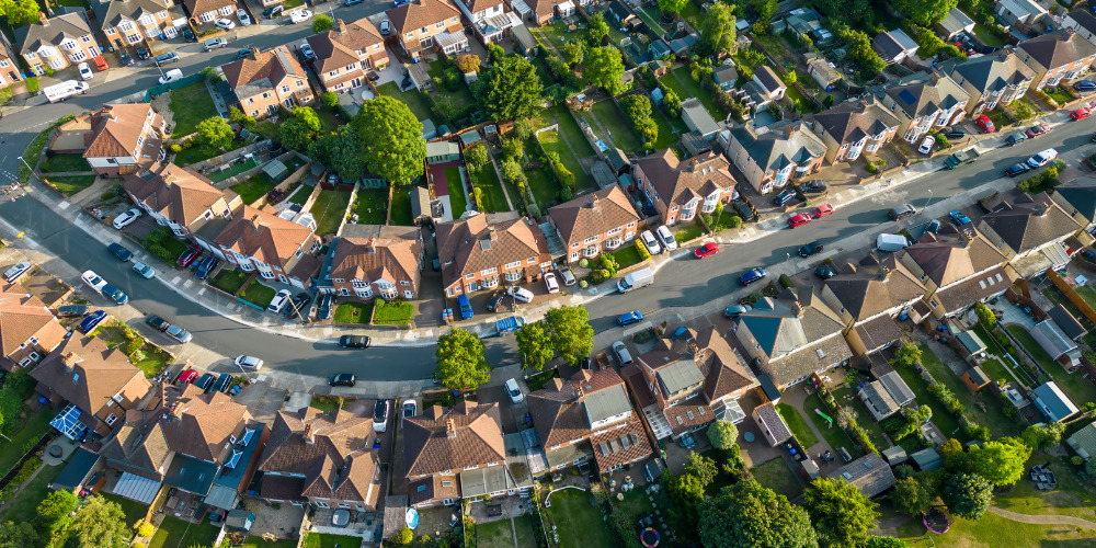 Arial view of street in UK housing crisis - The PHA Group