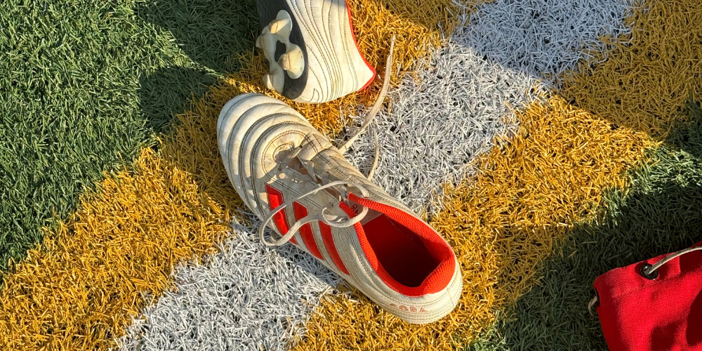 Football boots on grass at the 2026 World Cup - The PHA Group
