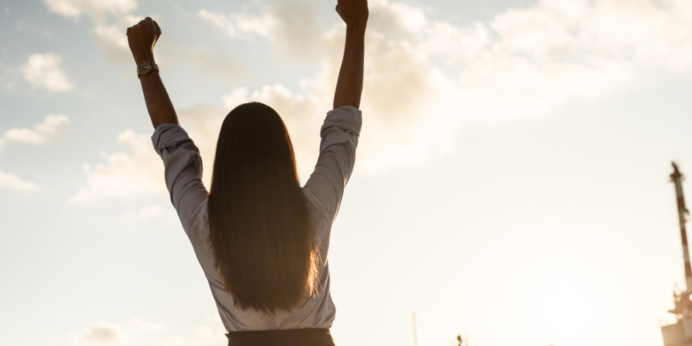 Person celebrating B2B PR campaign - The PHA Group