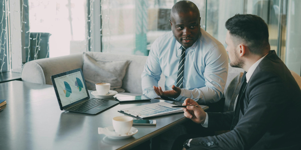 Man explaining what is a successful B2B PR campaign - The PHA Group