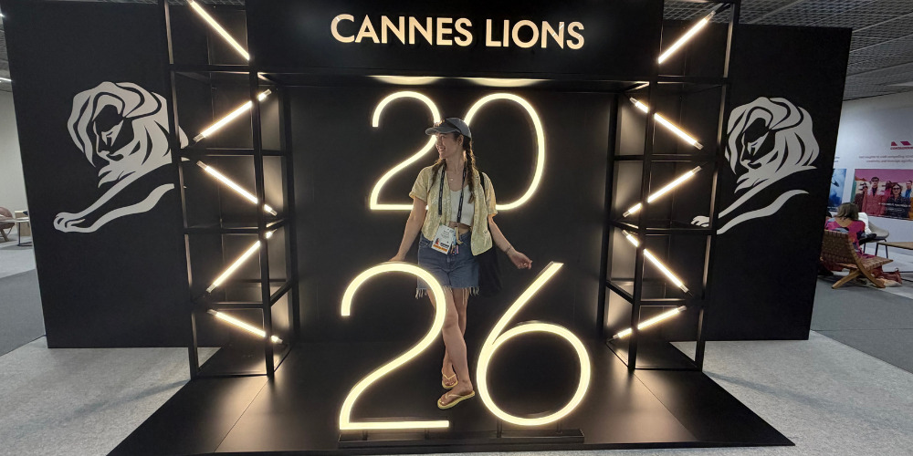 Bronte in front of Cannes Lions sign - The PHA Group
